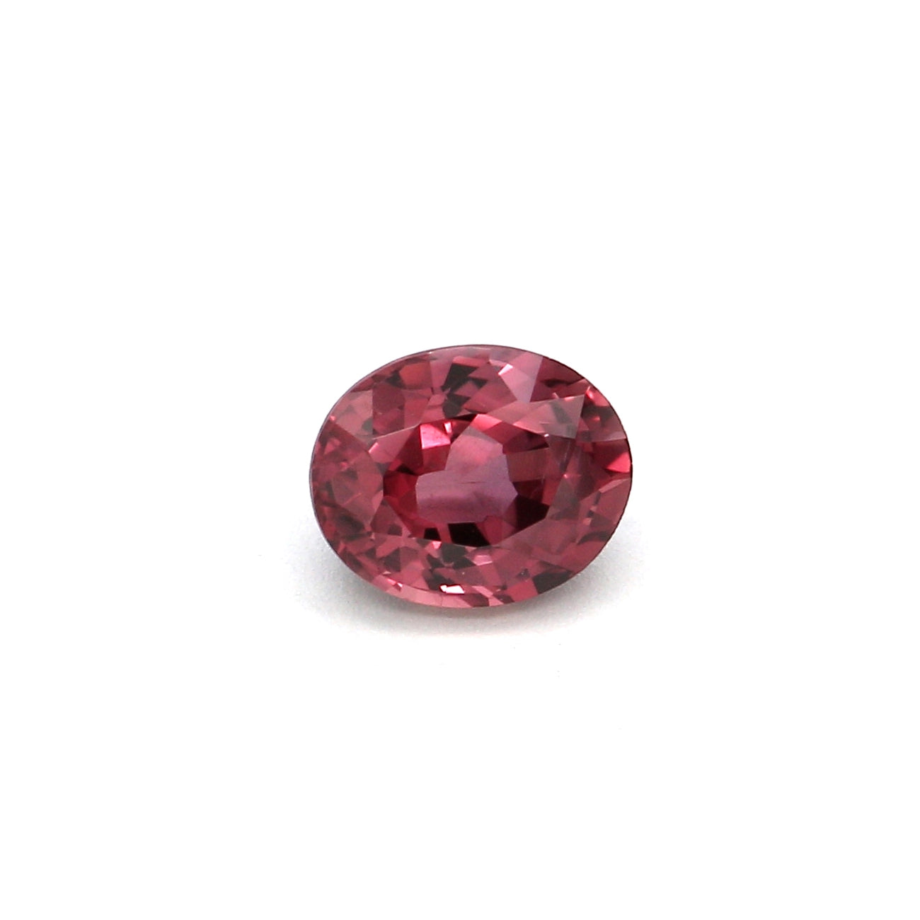 0.51ct Orangy Pink, Oval Sapphire, Heated, Mozambique - 5.01 x 4.11 x 2.86mm