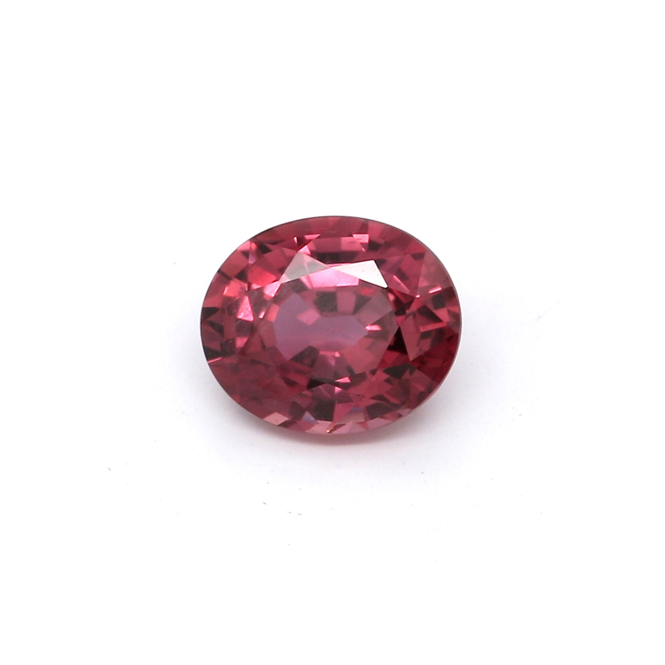 0.77ct Orangy Pink, Oval Sapphire, Heated, Thailand - 5.95 x 4.95 x 3.15mm