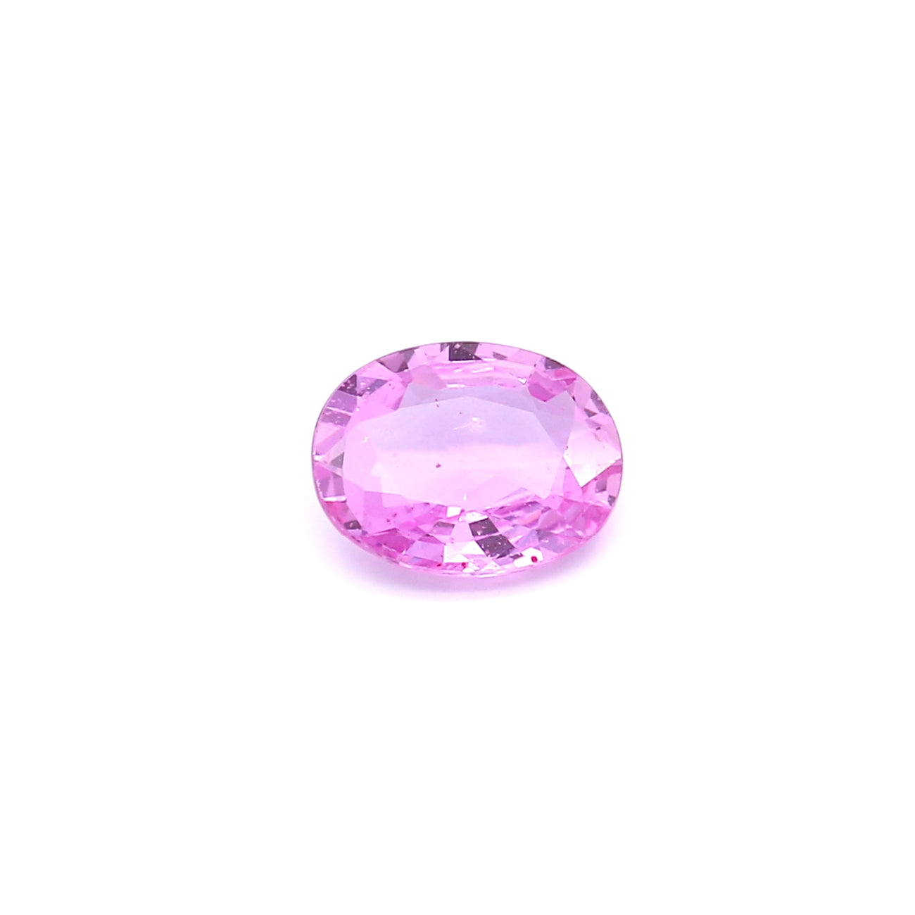 1.24ct Purplish Pink, Oval Sapphire, Heated, Madagascar - 7.85 x 6.11 x 2.82mm