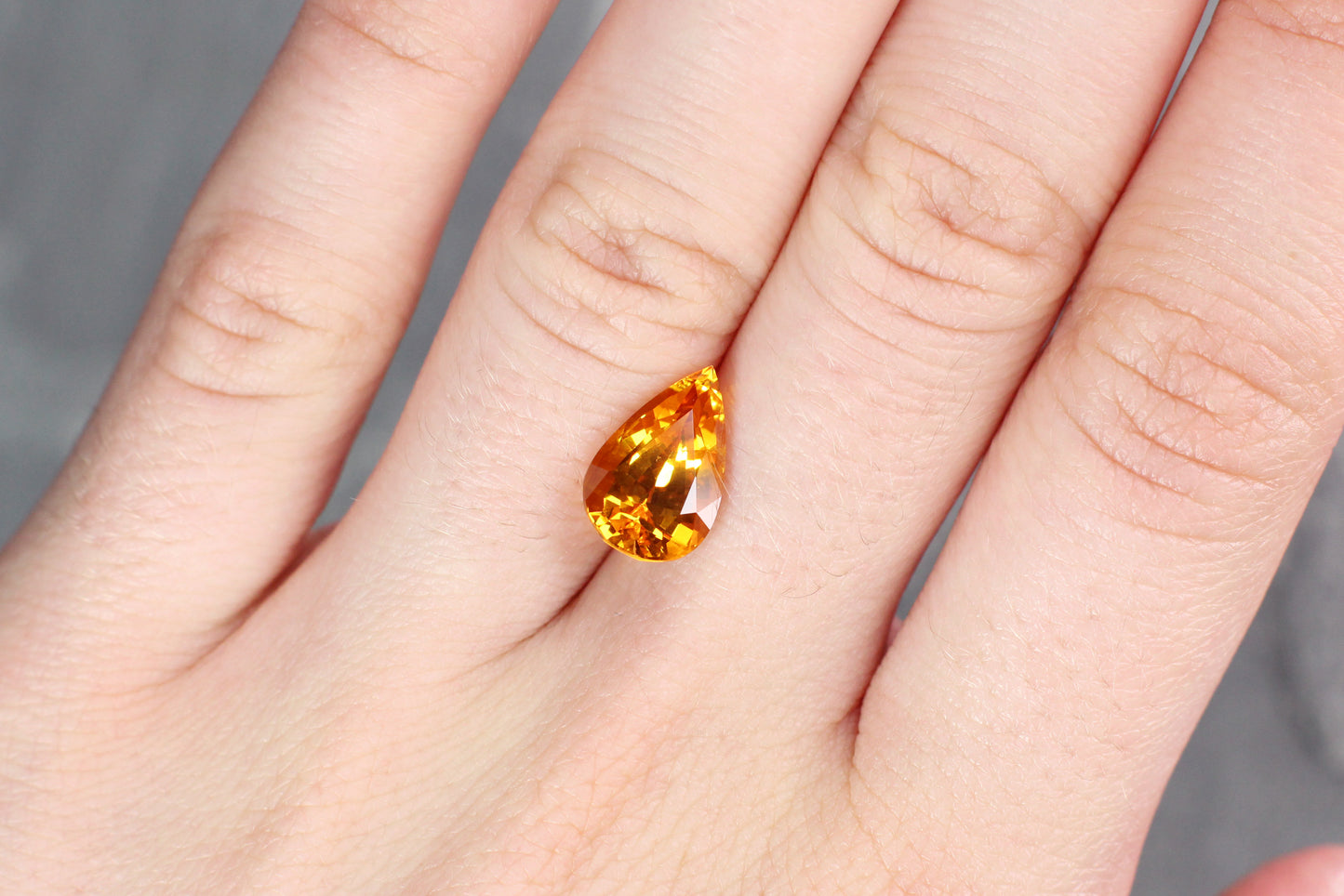 4.58ct Orangy Yellow, Pear Shape Sapphire, Heated, Sri Lanka - 12.51 x 8.05 x 6.24mm